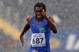 Alfred Adison of Solomon Islands in action during the Men's 100m heats (Getty Images)