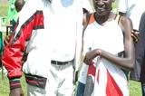 Pauline Korikwiang poses with Kenya’s five times world cross country champion Paul Tergat after she won the eight kilometre women’s race at the third Athletics Kenya cross country champions meeting in Meru, eastern Kenya (Elias Makori)