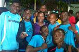Veronica Campbell-Brown with young athletes in the Bahamas