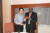 IAAF President Lamine Diack with Mr. Tang Weng Fei, the new president of the Singapore Athletics Association, at the dinner hosted by the SAA for the IAAF Delegates during the Youth Olympic Games (Imre Matrahazi)