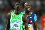 Kirani James (front) of Grenada and LaShawn Merritt of United States look to the scoreboard after finishing the men's 400 metres final during day four  (Getty Images)