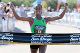 Bizunesh Deba of Ethiopia celebrates winning the San Diego Marathon (Victah Sailer)