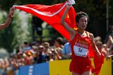 China's Xue Bai celebrates her IAAF World Championship win in the women's Marathon (Getty Images)