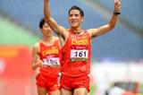 A quick stroll in the rain - Li Jianbo wins the 20km (Jiro Mochizuki)