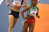 Meseret Defar holds of Kim Smith in the heats of the women's 3000m (Getty Images)