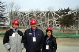 IAAF General Secretary Pierre Weiss (c) with BOCOG Athletics manager Chunde Shen (l) at the Olympic Stadium (IAAF)