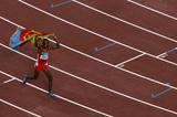 Zersenay Tadesse of Eritrea celebrates winning bronze in the men's 10,000m (Getty Images)