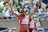 Alysia Montano celebrates the US triumph in the 4x800m at the Penn Relays (Kirby Lee)