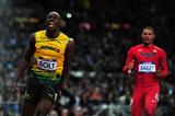 Usain Bolt celebrates winning gold in the 100m at the London 2012 Olympics (Getty Images)